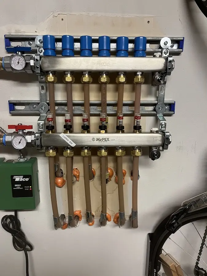 Plumber performing Water Heater Repair at a residential property in Elma